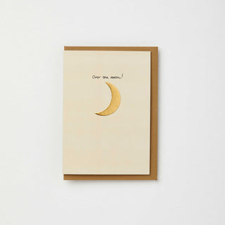 Over the moon good news/new baby card with gold foil: Kraft / With cellos