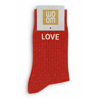 Red glitter socks with "Love" message
